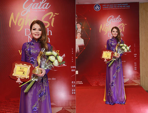 Hoa hậu Thanh Mai diện áo dài thuần Việt xúc động nhận giải thưởng vì cộng đồng.